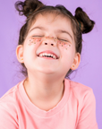 Children laughing with Oh Flossy kids biodegradable glitter