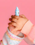 Oh-Flossy-Kids-Natural-Makeup-Lip-gloss-cotton-candy-in-girls-hands