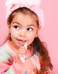 Oh-Flossy-Kids-Natural-Makeup-Lip-gloss-strawberry-with-girl