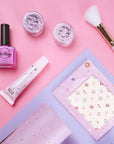 Oh Flossy makeup and beauty products for kids, including nail polish, lipgloss, glitter and blush pots, nail stickers and brushes