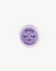 Lilac eyeshadow compact with a smiley face design on a white background