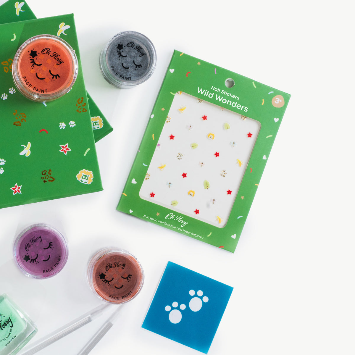 Oh Flossy Wild Wonder collection for kids including nail stickers, face paint sets, nail polish and animal footprint stencil.