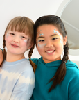 Oh Flossy Biodegradable Glitter - Demonstrated on children's faces